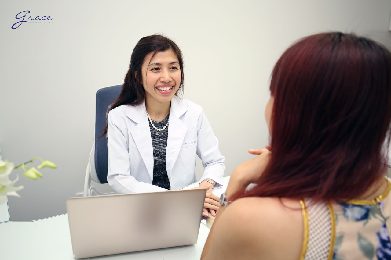 Tattoo removal consultation with dermatologist